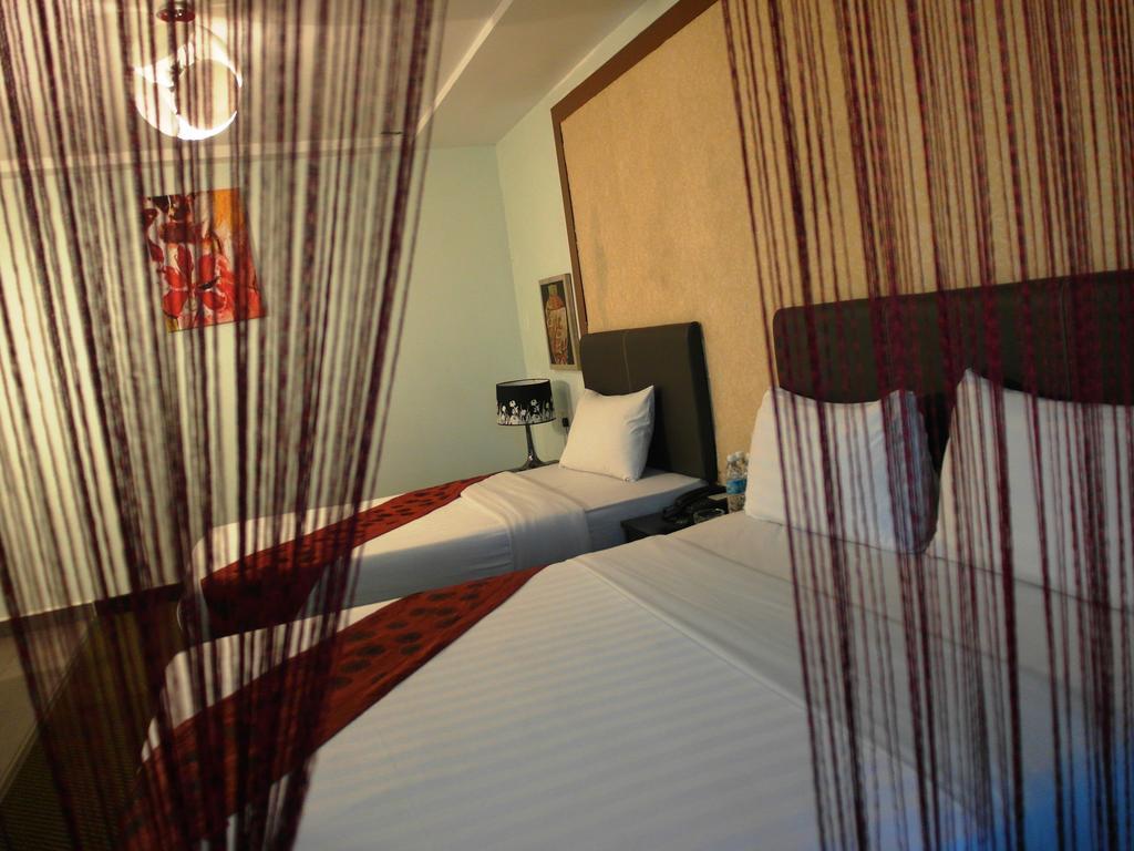 Le Hotel Кота-Кинабалу Номер фото