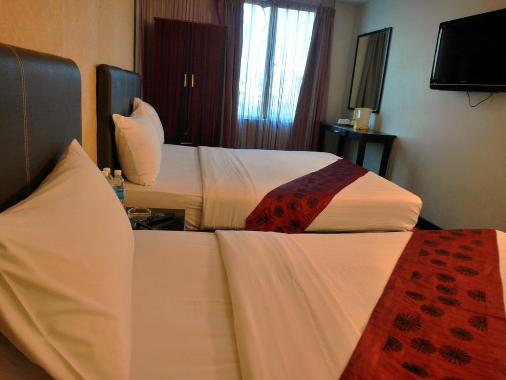 Le Hotel Кота-Кинабалу Номер фото